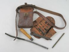 An MP34 Toolkit, pouch and pouch sling.