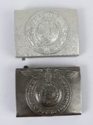 Two reproduction WWII German belt buckles.