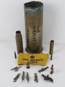 A Civil Defence Corp Rescue arm band, together with a quantity of lead painted Army figurines a/f,