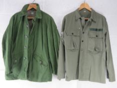 A US Air force Jacket, size Large together with a C50 Jacket.