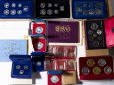Collection of coin proof sets including: Canadian 1977 set, Isle of Man 1977 silver proof set,
