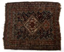 Caucasian blue ground rug with central ivory medallion and two smaller medallions within a foliate