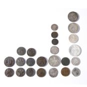 Collection of coins and token to include: Elizabeth I hammered shilling, James I shilling, 18th