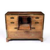 Campaign style chest of drawers late19th/early 20th Century, oak with brass banding, the central
