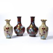 Pair of cloisonne vases Chinese, 20th Century, on red ground with peonies, 23.75 cm high and one
