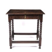 Oak side table 18th Century, with single drawer and bobbin turned supports, 68cm across, 49cm