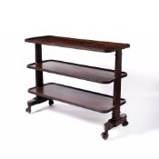 Mahogany three tier dumb waiter 19th Century, with carved ball and claw feet, 118.5cm across, 45.5cm