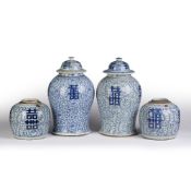 Two similar blue and white baluster lidded vases Chinese, 19th Century, decorated to the body with