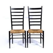 In the manner of Gio Ponti (1891 - 1979) Pair of ladderback chairs with raffia seats, unmarked,