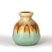 Ruskin pottery bottle vase, with blue, orange and yellow glaze, impressed mark 'Ruskin England,
