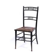 In the manner of Edward William Godwin (1833-1886) aesthetic movement, ebonised chair, indistinct