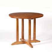 In the manner of Peter Waals (1870-1937) Cotswold school oak circular table, circa 1920, 76cm x 66cm