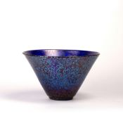 In the manner of Loetz iridescent blue glass bowl, unsigned, 14.5cm high