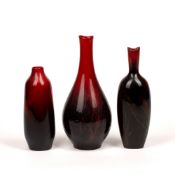 Royal Doulton Three 'Flambe Veineo' vases, all with stamped marks to bases, 20.5cm high, 18cm high