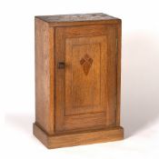 Cotswold School oak table top cabinet, circa 1930, 27cm x 42cm x 17cm