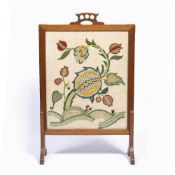 Arts and Crafts oak framed firescreen with crewel work tapestry panel, 56cm x 89cm x 22cm
