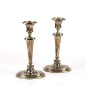 Pair of silver candlesticks on oval bases, bearing marks for Ellis & Co (Ellis Jacob Greenberg),