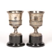 Matched pair of silver stem cups on later stands, one bearing marks for Alice & George Burrows II,