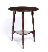 Arts & Crafts walnut occasional table with circular top, 53cm x 69cm