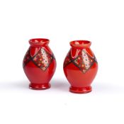 Kralik glass in the style of Loetz Pair of glass vases, red, with overpainted decoration,