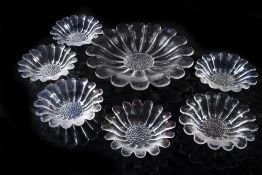 Frank Thrower (1932 -1987) for Dartington Crystal set of 'Daisy' bowls consisting of a large serving