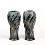In the manner of Okra glass pair of iridescent glass pinched vases, unsigned, 25cm high (2)
