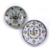 Polychrome pottery charger Dutch, 19th Century and another similar, each painted with flowers and