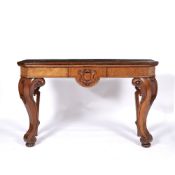 Walnut hall table 19th Century, with carved shield to the frieze on scroll supports and later top,