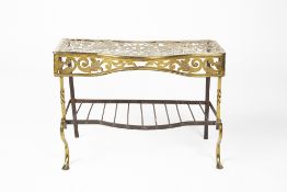 Brass and iron trivet George III, with engraved brass top depicting a central armorial flanked by