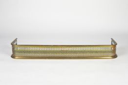 Brass pierced fender 19th Century, 116cm wide Condition: at present, there is no condition report