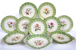 Collection of eight botanical porcelain cabinet plates with green and gold decoration, unsigned,