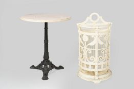 Cast iron stick stand with foliate designs, 40cm wide, 20cm deep, 75cm high and marble and cast iron