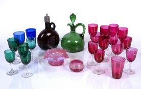 Collection of coloured glassware to include: white metal mounted ruby red glass decanter, a green