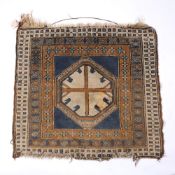 Persian small rug with central blue ground panel and wide foliate borders, 100cm x 90cm Condition: