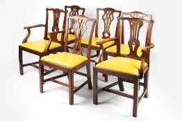 Set of four and two mahogany dining chairs 19th Century, each with splat back and yellow leather
