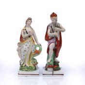Pair of Staffordshire figures circa 1820, depicting Venus and cupid with a dolphin and Neptune (2)