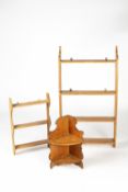 Set of pine graduated shelves 61cm wide, 113cm high, 15cm deep and two smaller sets of shelves (3)