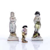 Pair of creamware figures English, circa 1800, each on a square base, 11.25 cm high, and a miniature