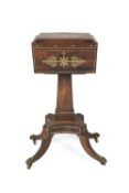 Rosewood and brass inlaid work table Regency period, with tapering column and four splayed supports,