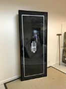 A modern black painted metal framed double-sided light box / advertising sign, bearing monogram 