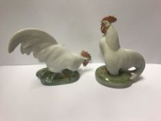 A pair of Royal Copehagen figures of cockerels 