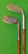 2x large headed stainless niblicks – one by Gibson for the Army & Navy C S Ltd, and a W M Wallace