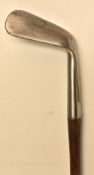 An interesting R Forgan and St Andrews Concaved Smooth Faced Lofting Iron - stamped with the