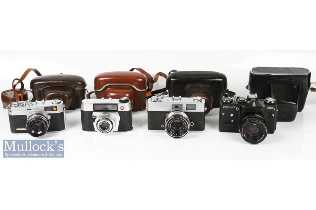 Various vintage cameras including a Zenith EM 35mm camera with Helios-44M 2/58 lens with leather
