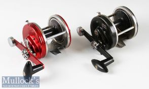 2x Abu Ambassadeur multiplier reels to include 9000 series in red and chrome, marked 721102 and a