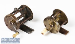 Early brass pin stop all brass multiplier reel measures 1 ¾” x 2 3/8” wide with white handle crank