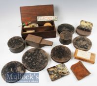 Selection of black japanned cast tins with a weight tin included, all circular in shape, two with