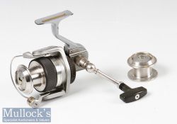 Good Abu Garcia Suveran spinning reel and spare spool with very light signs of use, spins very well,