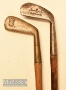 2x Metal iron head shaped golf walking sticks one showing the Thistle brand cleek mark and a