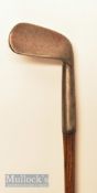 Unnamed early heavy rut niblick the head measures 2 ½” x 1.7/8” with a 4 ½” hosel, fitted with